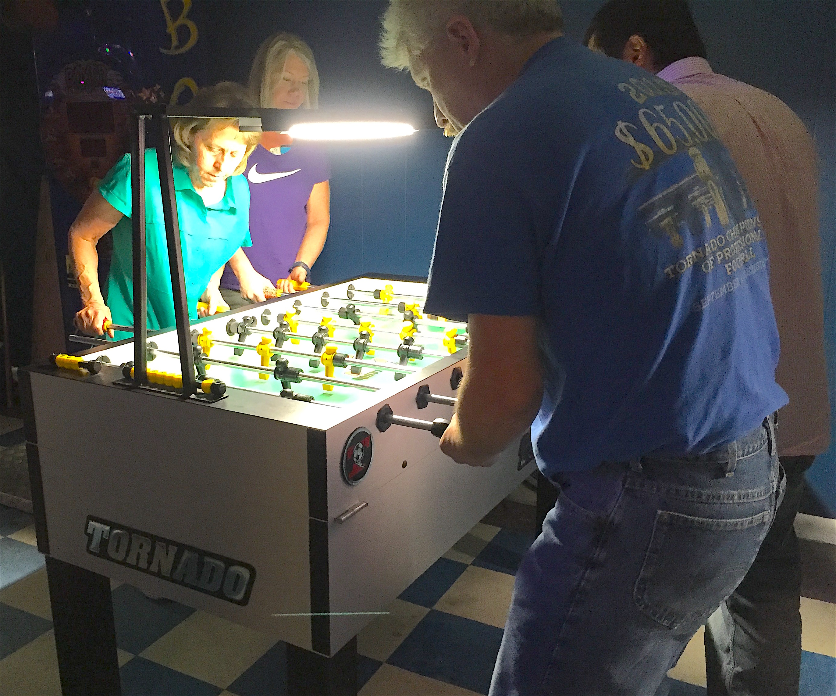 Foosball players competing in Cullman at the North Alabama Open foosball tournament.