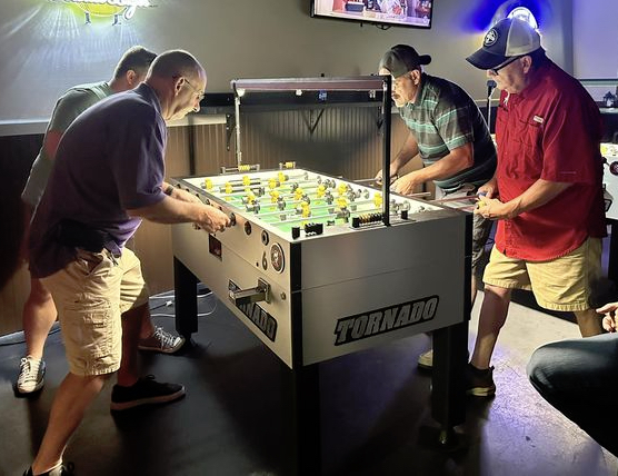 Players competing during the finals of a Foos-Tuesday effort held in Madison,AL. September 19th 2023. Winners are shown from left Drew Ashe & Rodney Jenkins over Jeremy Monroe & Terry Lamb.